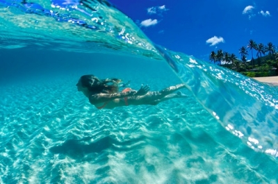 Crystal clear blue wave, Bora Bora, French Polynesia