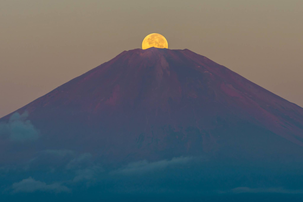 Amazing moon over Mount Fuji, Japan