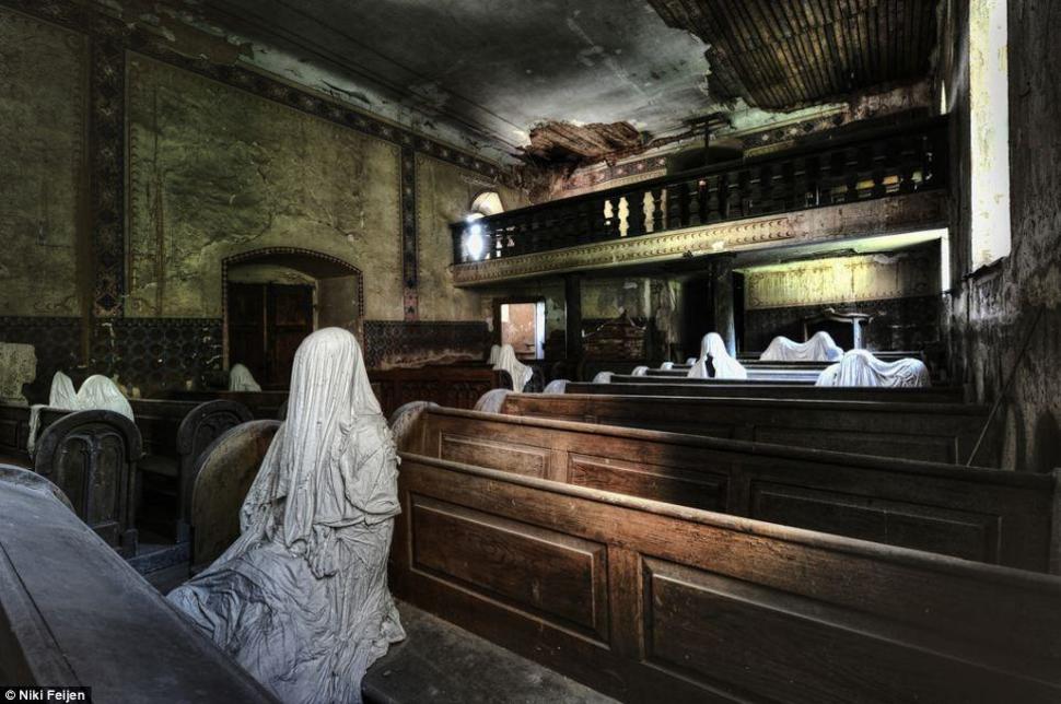 An abandoned church with a few lingering parishioners, Netherlands