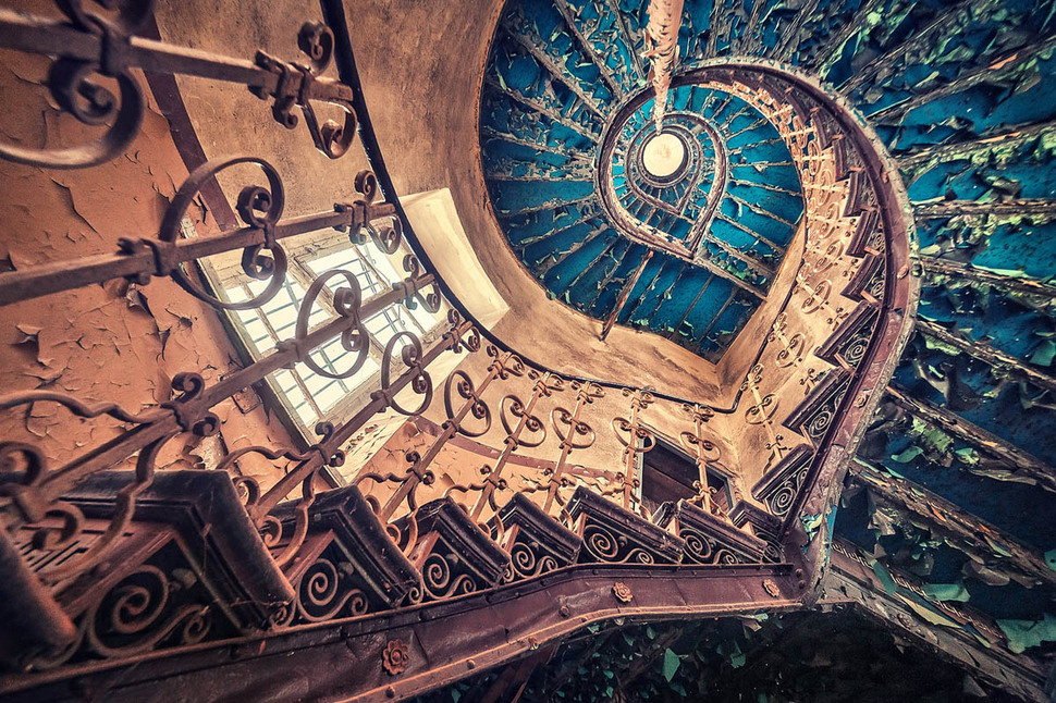 Blue spiral staircase in a European castle